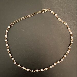 Gold pearl necklace